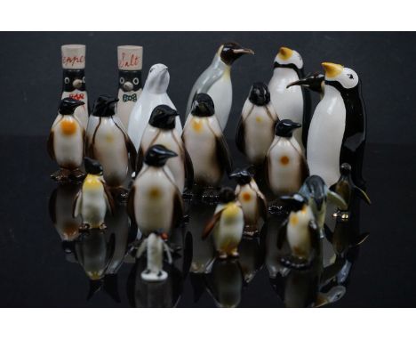 A collection of ceramic Penguins to include Carlton Ware, Goebel and Coalport examples. 