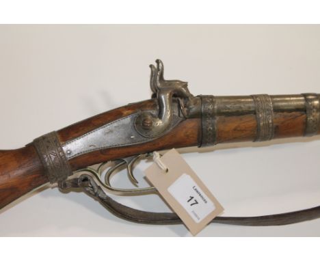 A DOUBLE BARREL PERCUSSION HUNTING RIFLE 'ARABISED'. A  double barrel percussion hunting rifle which has been altered by an A