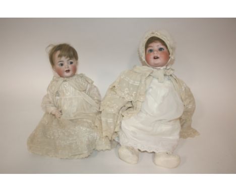 KAMMER & REINHARDT FLIRTY EYED DOLL with flirty blue eyes and open mouth, head restored. Also with a large Ernst Heubach doll
