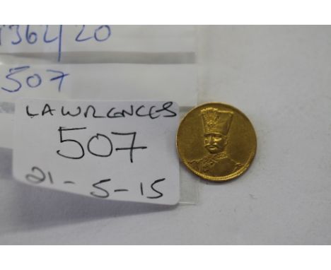 A TOMANS PIECE. A Persian 2 Tomans gold piece, with obverse portrait of Nasir al-din Shah.