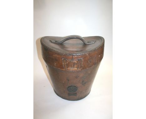 LEATHER HAT BOX a vintage leather hat box with silk lined interior and metal lock. 39cms high