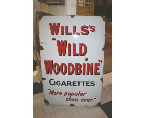 WILLS ENAMEL SIGN a large enamel sign for Wills's Wild Woodbine Cigarettes, 'More popular than ever'. 92 by 60cms.