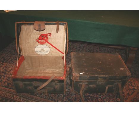 TWO VINTAGE CABIN TRUNKS including a leather and canvas trunk with original label for J C Sweeney, Manufacturer of Portmantea