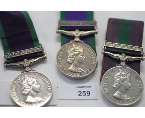 THREE CAMPAIGN SERVICE MEDALS. A CSM with bar Cyprus named to 23509374 Gdsm J M Finlan. Grenadier Guards. 2. A CSM bar Northe