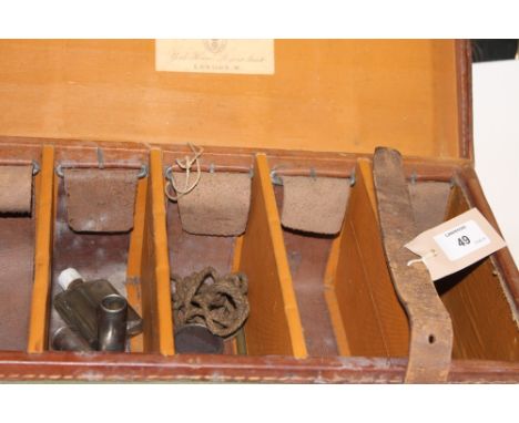 A CARTRIDGE MAGAZINE. A webbing cartridge magazine with inset Army & Navy Gun Department label. Complete with dividers but la