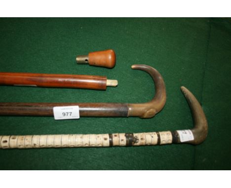 HORSE MEASURING WALKING STICK with a bamboo shaft, revealing a measuring stick inside. Also with a horn handled walking stick