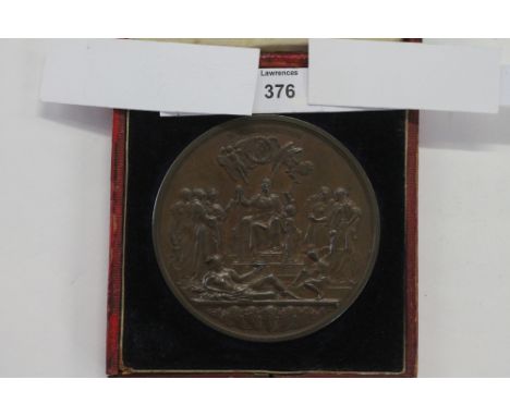 A CASED 1887 BOEHM MEDALLION. J E Boehm's bronze 77mm diameter 1887 medallion, in original case. Victoria Regina et Imperatri