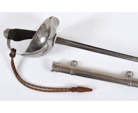 A 1912 PATTERN OFFICERS SWORD. A 1912 pattern Cavalry Officers sword with plated scabbard. Made by Wilkinson Sword and number