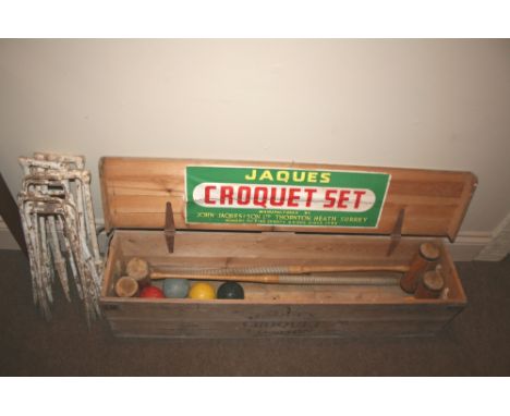 VINTAGE JACQUES CROQUET SET with four mallets and balls and various metal hoops, in it's original wooden box. Missing the cen