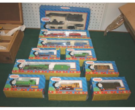 HORNBY LOCOMOTIVES - THOMAS THE TANK ENGINE a large qty of boxed locomotives and rolling stock, all relating to Thomas the Ta