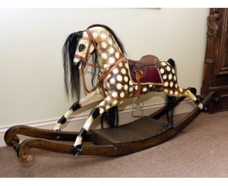 VICTORIAN STYLE ROCKING HORSE a rocking horse cast from an original Victorian example, mounted on a wooden rocker and with ha