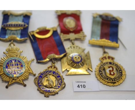 FOUR MASONIC MEDALS. Three Silver/Gilt Masonic awards the first with enamel and Grand Lodge of England/ Kangaroo centre. Pres