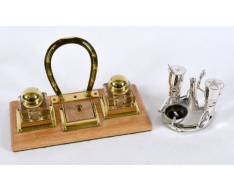 INKSTAND - HORSE RACING INTEREST a brass and wooden inkstand, the inkwells in the form of riding hats and brass pen holder in