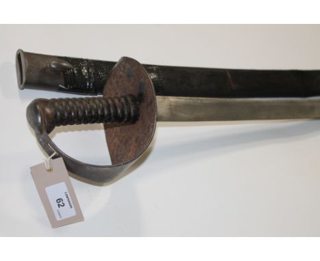 A 19thC NAVAL CUTLASS. A British model 1845/1858 naval cutlass and scabbard , C1850 by Mole of Birmingham. 26.3/4" slightly c
