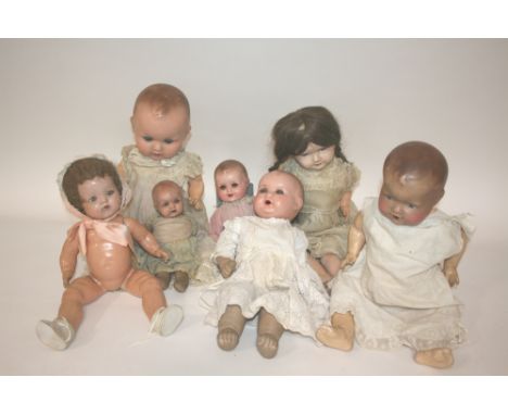 COMPOSITION HEAD DOLLS including a large example by Armand Marseille, Model 518. Also with a variety of other composition hea