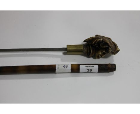 A SWORDSTICK. A 20thC swordstick with classical figure pommel, square tapering 20.3/4" blade.