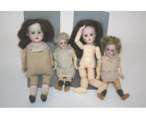 BISQUE HEAD DOLLS 4 small bisque head dolls, including a Armand Marseille 370 (repaired), and 3 other small bisque head dolls