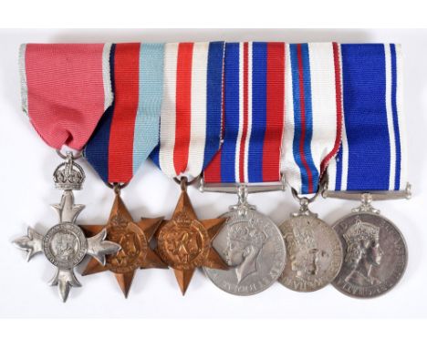 AN MBE - GUARDS ARMOURED DIV & POLICE MEDALS GROUP OF SIX. A QE11 Civil issue MBE, 1939/45 & France - Germany Stars, War Meda