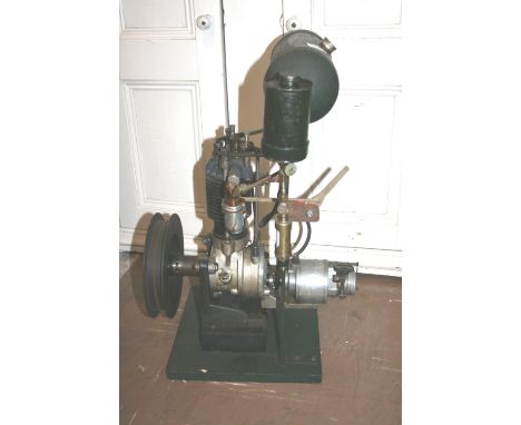 VERTICAL STATIONARY ENGINE a single cylinder engine with exposed valve gear and ignition by magneto. 60cms high