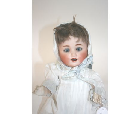 BISQUE HEAD GERMAN DOLL - MODEL 201 with weighted blue eyes, open mouth and bent limb body. Marked, 201 and makers mark, poss