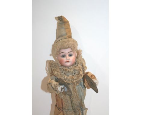 BISQUE HEAD AUTOMATON DOLL interesting doll with a bisque head with fixed blue eyes and open mouth, original clothing, wooden