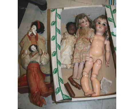 BISQUE HEAD DOLLS including a black doll with fixed brown eyes and open mouth (parts of legs missing and detached), stamped D