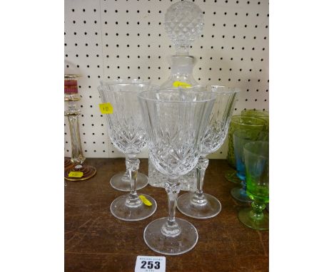 Square based decanter and stopper and four good glasses
