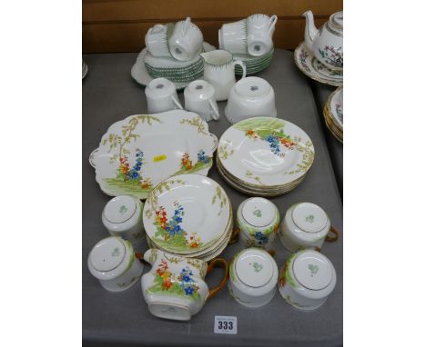Aynsley enamel painted floral decorated part teaset (twenty piece) and a Paladin china twenty one piece teaset