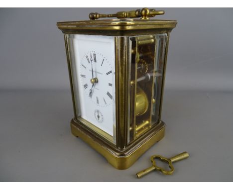 Matthew Norman, London brass cased gong strike carriage clock