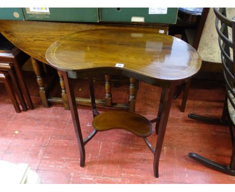 Kidney shaped occasional table with lower shelf and inlay