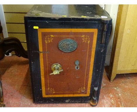 Vintage S Withers &amp; Co metal safe with key, the handle formed as a fist gripping a bar