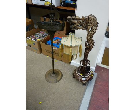 Wooden carved dragon table lamp and a longboat smoker's companion