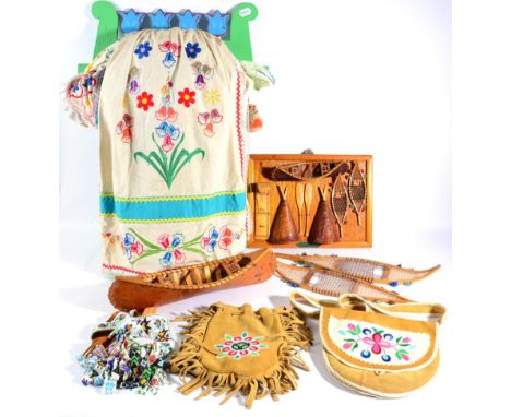 An Interesting Collection of Cree Indian Artefacts, circa 1967-70, comprising a Tekanagan (baby carrier) of green painted woo