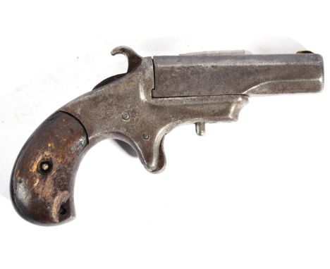 An XL Derringer, .42 rimfire, the 6.5cm octagonal barrel swivelling to the side for loading, the top flat marked XL DERRINGER