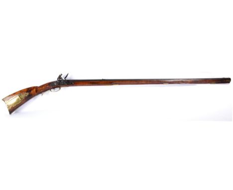 An Early 19th Century Flintlock Kentucky Rifle, the 108cm octagonal steel barrel signed J PALM to the top flat, with foliate 