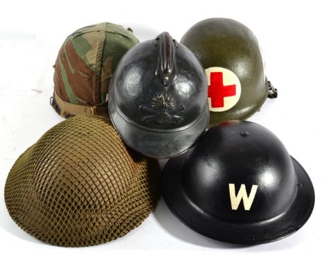 Two Second World War Brodie Helmets, one with camouflage netting, the liner dated 1940, the other to an Air Warden by BMB; a 