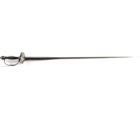 An 18th Century Small Sword, the 80cm colichemarde steel blade engraved with tendrils, the steel hilt with double shell guard