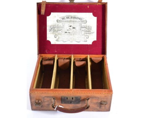 An Early 20th Century Brown Leather-Covered Cartridge Case, the lid initialled, ''S.N.F.'', the lid underside baise-lined and