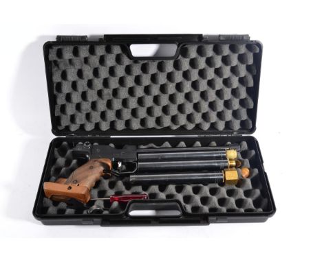 PURCHASER MUST BE 18 YEARS OF AGE OR OVER A Feinwerkbau Model 2 .177 CO2 Target Pistol, number 17883, with carved wood grip, 