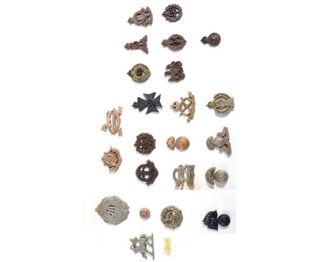 A Collection of Twenty Four Second World War Economy Bakelite Cap Badges, including Hampshire Regiment, East Yorkshire, West 