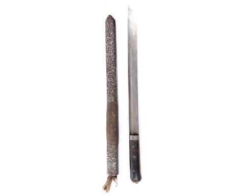 A Late 19th Century Tibetan Ceremonial Knife, the 33cm straight blade with a deep narrow fuller to the back edge, the steel h