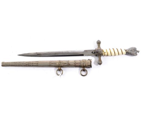 A German Third Reich Kriegsmarine 1st. Model Dress Dagger, the 25 cm double edge twin fullered blade bearing post-1941 maker'