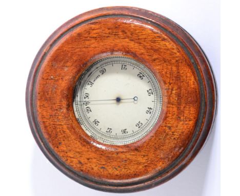 An Early 20th Century Brass-Cased Pocket Aneroid Barometer by Short & Mason, of circular form with silvered dial and ring sus