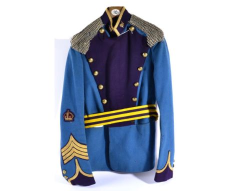 An Edwardian City of London ''Rough Riders'' Full Dress Tunic to a Squadron Sergeant Major, in light blue wool with dark purp