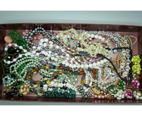 A collection of vintage necklets, earrings, etc.