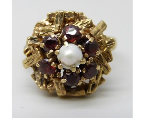 A 1970s 9ct gold, garnet and pearl cluster ring, London 1974, 7.1g, pearl a/f, O