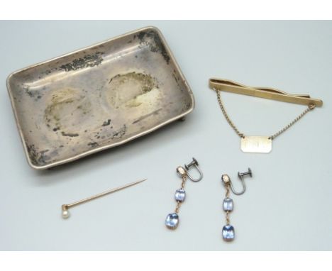 A small silver card tray, 10cm, 45g, a yellow metal set pearl stick pin, 1.2g, a pair of yellow metal drop earrings (remounte