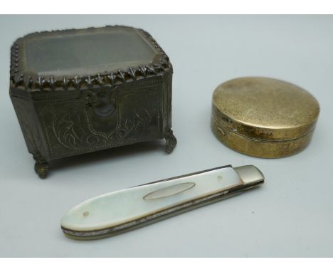 A Goldsmiths and Silversmiths Co. silver circular pill box (dented) together with a 19th Century metal casket, 3cm tall) and 