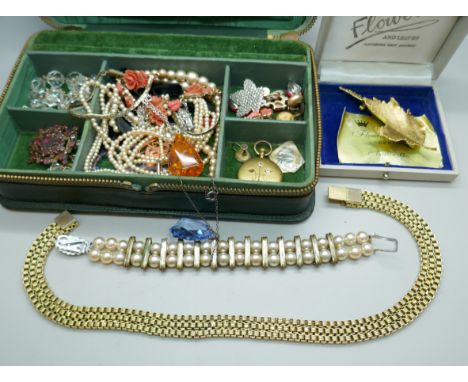 A collection of vintage costume jewellery including a garnet brooch, a plated collar, brooch, a/f, faceted bead necklace, loc