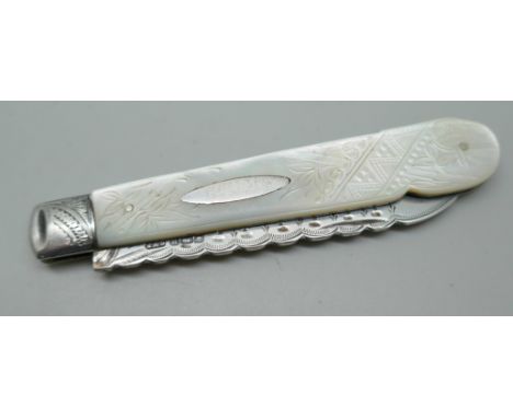 A silver bladed fruit knife with engraved decoration to  the mother of pearl handle and blade, Sheffield 1912, 8.9cm closed *